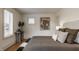 Comfortable bedroom with a plush bed, natural light from the windows, and modern decor at 304 E 17Th St, Indianapolis, IN 46202