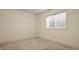 Cozy bedroom with neutral carpet and a bright window, perfect for a peaceful retreat at 304 E 17Th St, Indianapolis, IN 46202