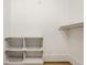 Organized closet with built-in shelving and wire baskets for optimal storage and space management at 304 E 17Th St, Indianapolis, IN 46202
