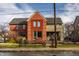 Charming two-story red brick home with a well-manicured front yard and inviting curb appeal at 304 E 17Th St, Indianapolis, IN 46202