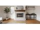 Modern fireplace with sleek design, complemented by tasteful decor and hardwood floors at 304 E 17Th St, Indianapolis, IN 46202