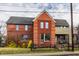 Exterior of home with brick and light siding and a well-kept lawn at 304 E 17Th St, Indianapolis, IN 46202