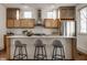 Bright kitchen featuring stainless steel appliances, subway tile backsplash, and large island with seating at 304 E 17Th St, Indianapolis, IN 46202
