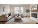 Elegant living room featuring a fireplace, neutral tones, and stylish decor for a welcoming atmosphere at 304 E 17Th St, Indianapolis, IN 46202