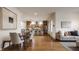 Open-concept living space featuring a modern kitchen and dining area for a seamless living experience at 304 E 17Th St, Indianapolis, IN 46202