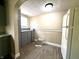 Cozy kitchen with built-in cabinets and modern white refrigerator at 3426 W Michigan St, Indianapolis, IN 46222