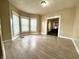 Bright living room featuring wood floors and a bay window for ample natural light at 3426 W Michigan St, Indianapolis, IN 46222