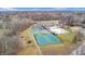 Aerial view of the community amenities including the tennis courts, playground, and swimming pool at 3779 W County Line Rd, Greenwood, IN 46142