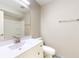 Bright bathroom with a white vanity, mirror, and a shower over bath at 3779 W County Line Rd, Greenwood, IN 46142