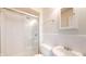 Tiled bathroom featuring a walk-in shower, white vanity, and toilet at 3779 W County Line Rd, Greenwood, IN 46142