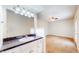 Vanity area with a large mirror next to main bedroom door at 3779 W County Line Rd, Greenwood, IN 46142