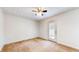 Simple bedroom with carpet and a door leading to the exterior at 3779 W County Line Rd, Greenwood, IN 46142