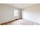 Neutral bedroom featuring carpet, white walls, and a window with a view at 3779 W County Line Rd, Greenwood, IN 46142