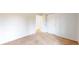 A cozy carpeted bedroom featuring an open door to another room at 3779 W County Line Rd, Greenwood, IN 46142