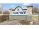 Monument sign for the Carefree community featuring stone accents at 3779 W County Line Rd, Greenwood, IN 46142