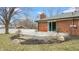 Wooden deck with stone steps off of sliding glass doors with a view of the backyard at 3779 W County Line Rd, Greenwood, IN 46142
