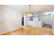 Empty dining room featuring hardwood floors and natural lighting at 3779 W County Line Rd, Greenwood, IN 46142