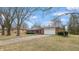 Charming brick home with a long driveway and an attached two-car garage at 3779 W County Line Rd, Greenwood, IN 46142