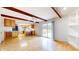 Open-concept living room and kitchen area with hardwood floors and natural light at 3779 W County Line Rd, Greenwood, IN 46142