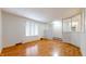 Bright living room featuring wood floors, large window, and an open design at 3779 W County Line Rd, Greenwood, IN 46142