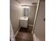Bathroom with white vanity, sink, and mirror, featuring neutral walls at 3851 N Campbell Ave, Indianapolis, IN 46226