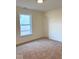 Bedroom with carpet and one window. Room is painted a neutral color at 3885 Berkdale Ct, Columbus, IN 47203