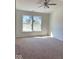 Bedroom with carpet, neutral paint, a ceiling fan and two large windows at 3885 Berkdale Ct, Columbus, IN 47203