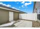 Enclosed patio with white fencing, offering privacy and a comfortable outdoor space for relaxation or entertaining at 3913 Wren Dr, Brownsburg, IN 46112