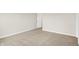 Bedroom with beige carpet, white walls and trim, and white door at 3913 Wren Dr, Brownsburg, IN 46112