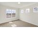 Bright bedroom with neutral carpet and multiple bright windows at 3913 Wren Dr, Brownsburg, IN 46112