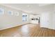 Bright and airy living room with an open floor plan and modern design featuring a view into the kitchen at 3913 Wren Dr, Brownsburg, IN 46112