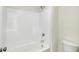 Clean bathroom featuring a shower-tub combo and simple design at 3959 Wren Dr, Brownsburg, IN 46112