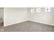 Bright bedroom with plush carpeting, neutral walls, and natural lighting at 3959 Wren Dr, Brownsburg, IN 46112
