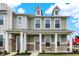 Charming two-story home with stone accents, covered porch, and white pillars at 3959 Wren Dr, Brownsburg, IN 46112