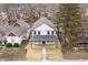 Aerial view of the two-story home showcasing its roofline, siding, and surrounding landscape at 4054 Boulevard Pl, Indianapolis, IN 46208
