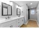 This bathroom features double sinks, lots of counter space, and modern fixtures at 4054 Boulevard Pl, Indianapolis, IN 46208