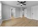 Spacious bedroom with hardwood floors and white painted doors at 4054 Boulevard Pl, Indianapolis, IN 46208