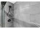 This modern shower features sleek tile and contemporary fixtures at 4054 Boulevard Pl, Indianapolis, IN 46208