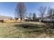 Large backyard featuring a fire pit and plenty of space for activities at 4063 S Meadow Wood Ct, New Palestine, IN 46163