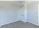 Bedroom with ceiling fan, neutral carpet and paint, and one window at 4063 S Meadow Wood Ct, New Palestine, IN 46163