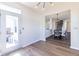 Open dining area featuring hardwood floors and easy access to the backyard at 4063 S Meadow Wood Ct, New Palestine, IN 46163