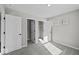 Bedroom with neutral carpet and natural light from the triple window at 4180 Douro Trl, Westfield, IN 46062