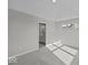 Bedroom with natural light and neutral carpet is conveniently located near a bathroom at 4180 Douro Trl, Westfield, IN 46062