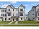 Inviting exterior of new construction home showcasing a modern farmhouse design and well-manicured lawn at 4180 Douro Trl, Westfield, IN 46062