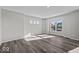 Inviting living room filled with natural light, showcasing hardwood floors and ample space for relaxation and entertainment at 4180 Douro Trl, Westfield, IN 46062