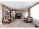 Spacious living room featuring comfortable seating, neutral tones, and ample natural light at 4808 N Tuxedo St, Indianapolis, IN 46205