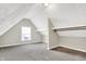 Attic space with carpet, shelves, a window and natural light at 523 Terrace Ave, Indianapolis, IN 46203