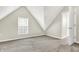 Carpeted room featuring bright window and white walls at 523 Terrace Ave, Indianapolis, IN 46203