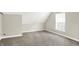 Cozy carpeted room with white trim and a bright window at 523 Terrace Ave, Indianapolis, IN 46203