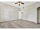 Spacious bedroom with neutral walls, carpeted floor and ceiling fan at 523 Terrace Ave, Indianapolis, IN 46203